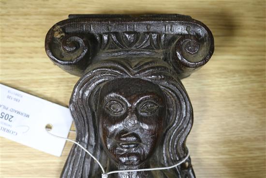 A 17th century oak mermaid pilaster